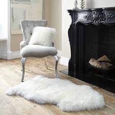 UGG RUG LONG WOOL NATURAL